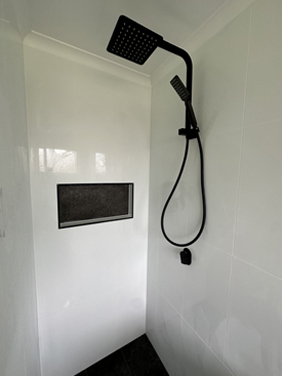 Matte black shower set with niche